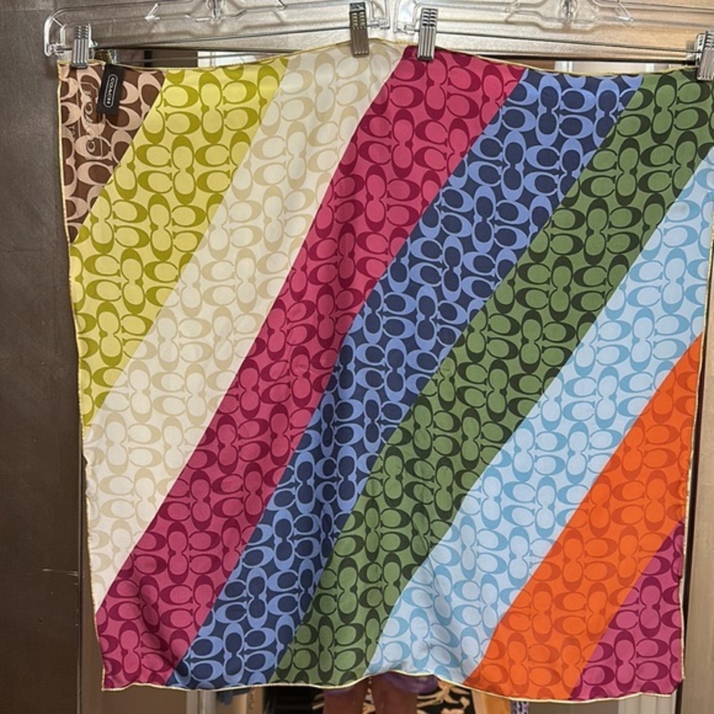 Unique COACH Multi color silk scarf.